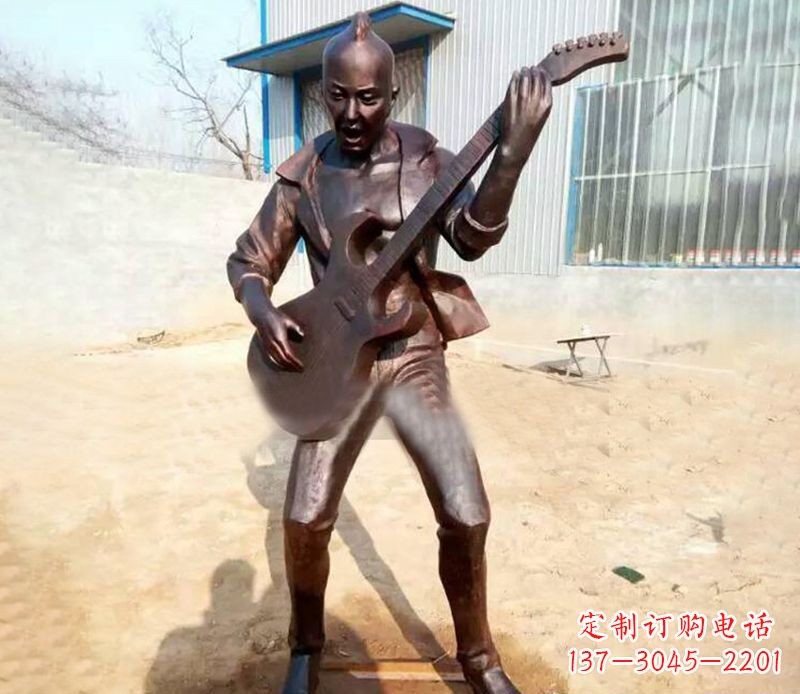 酒泉弹吉他的公园人物铜雕
