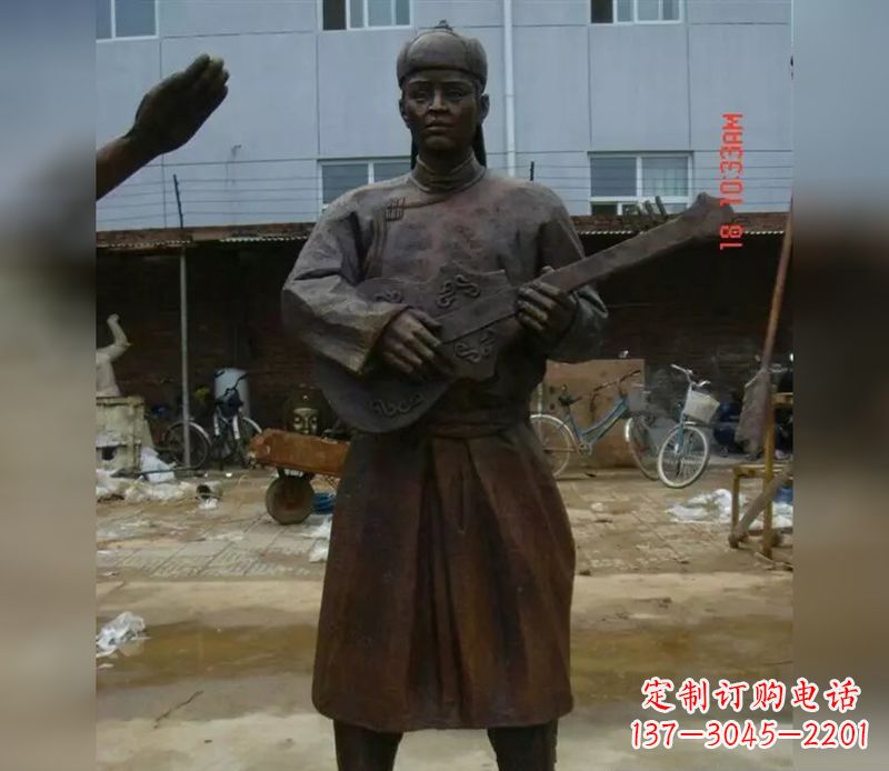 酒泉蒙古族男人演奏公园人物铜雕