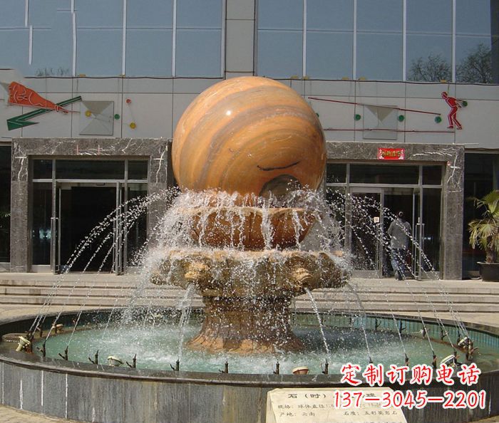 酒泉石来运转球晚霞红风水球石雕