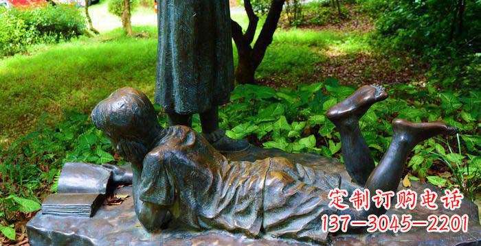 酒泉校园趴着看书的小男孩人物铜雕