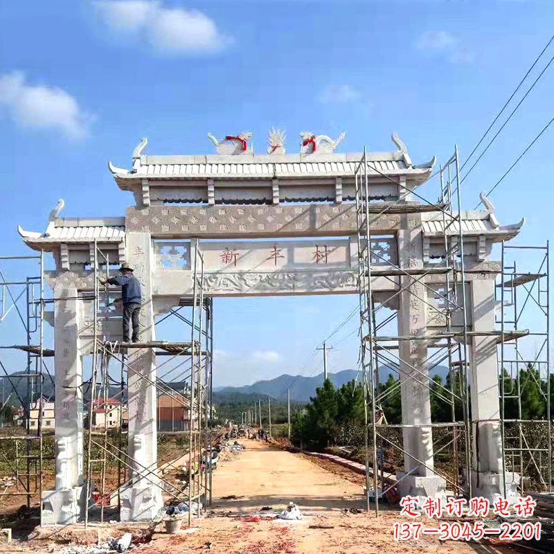 酒泉新丰村三门石雕牌坊